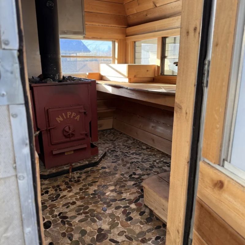 Nippa stove and river stone floor